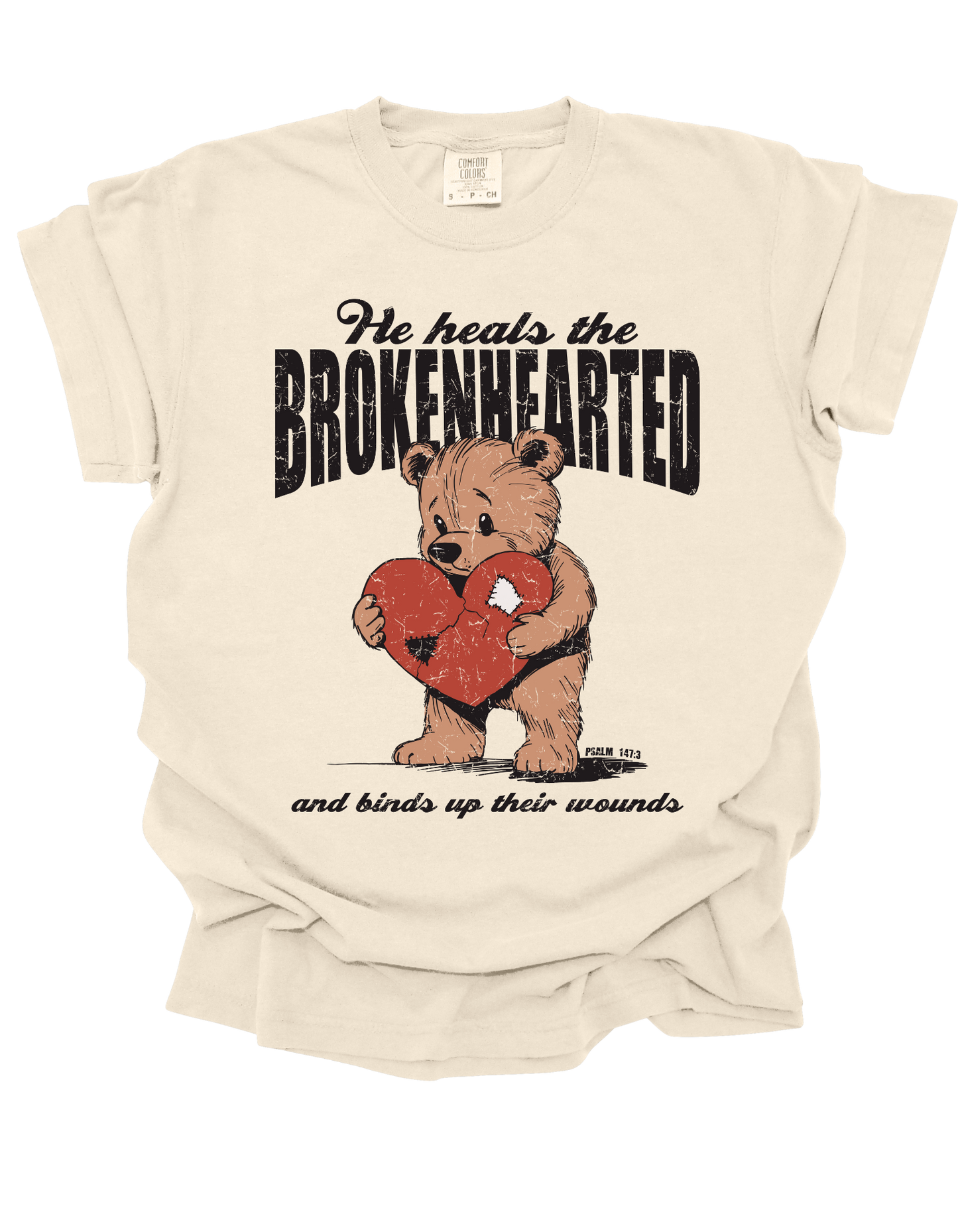 HE HEALS THE BROKENHEARTED - Tee