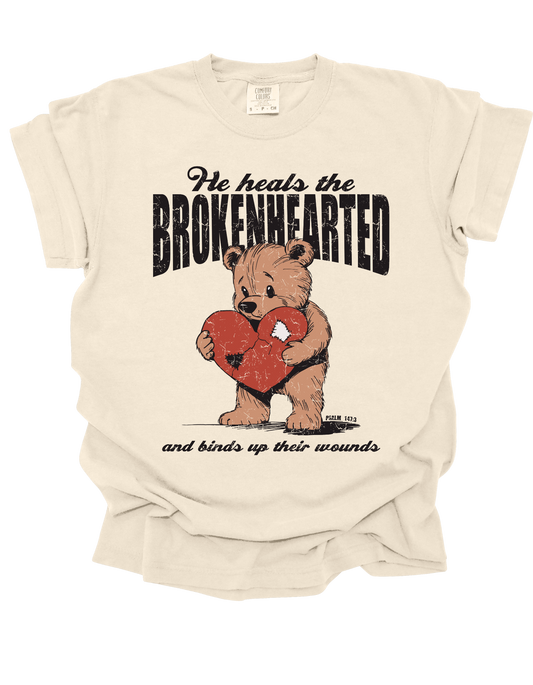 HE HEALS THE BROKENHEARTED - Tee